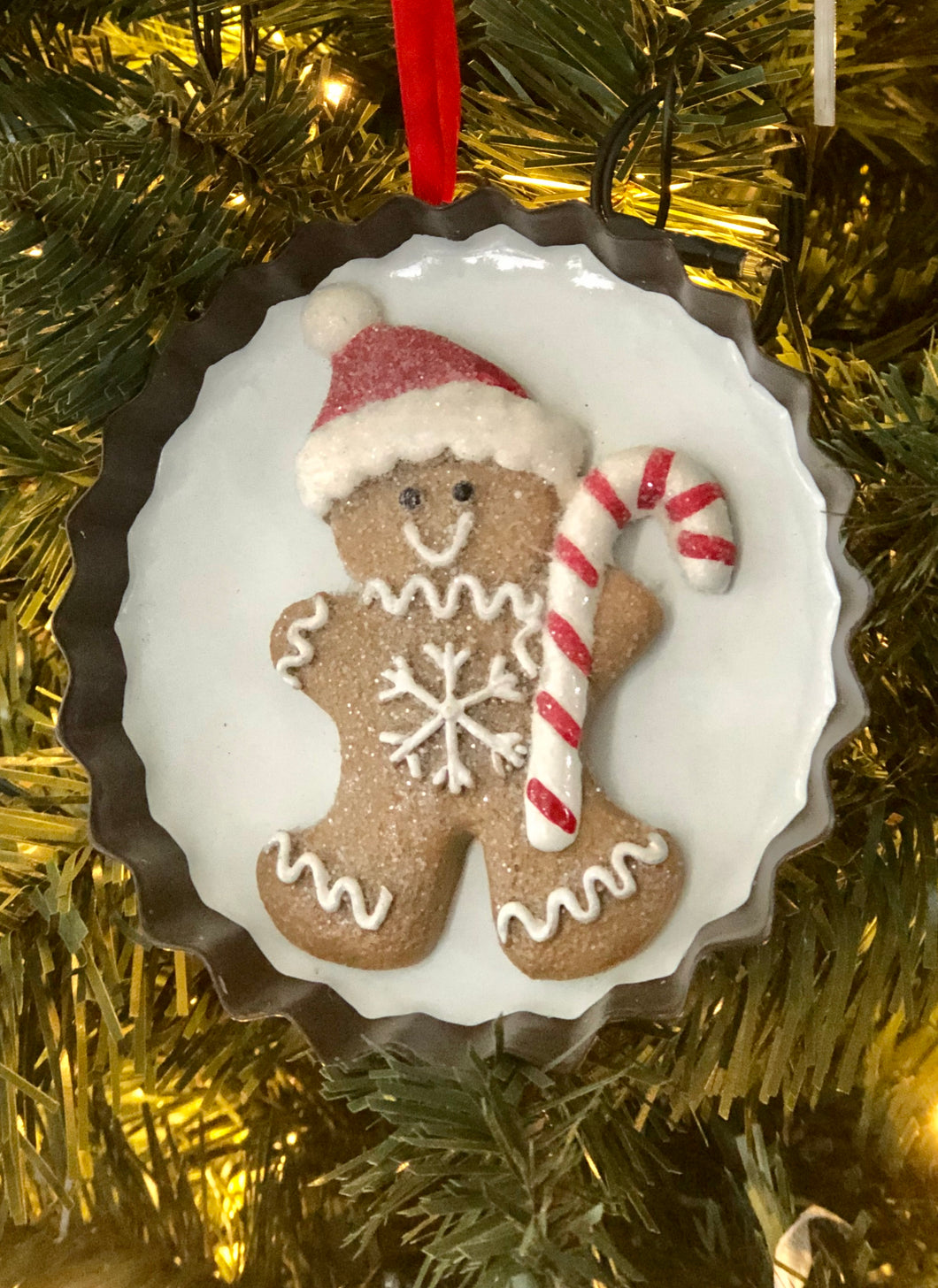 Gingerbread Boy in Sweet Tart Shaped Tin.